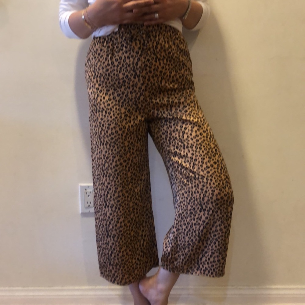New, Tag says size youth 12 will fit small, medium and large, waist 13” to 15”